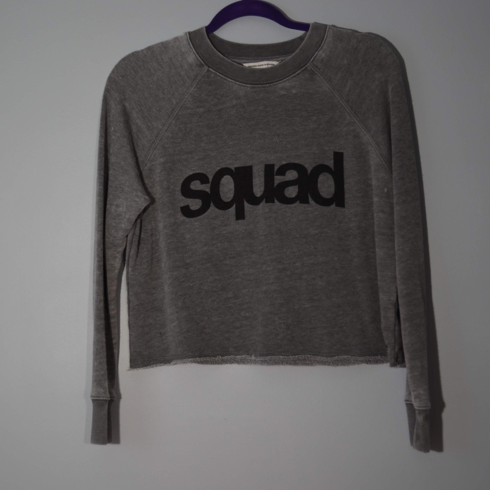 Grey cropped “squad” sweatshirt